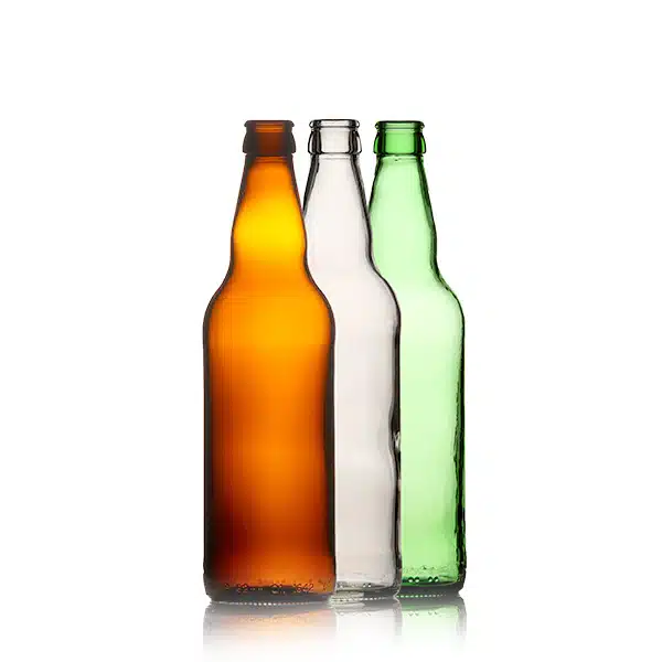 Three glass bottles in amber, flint, and green colours