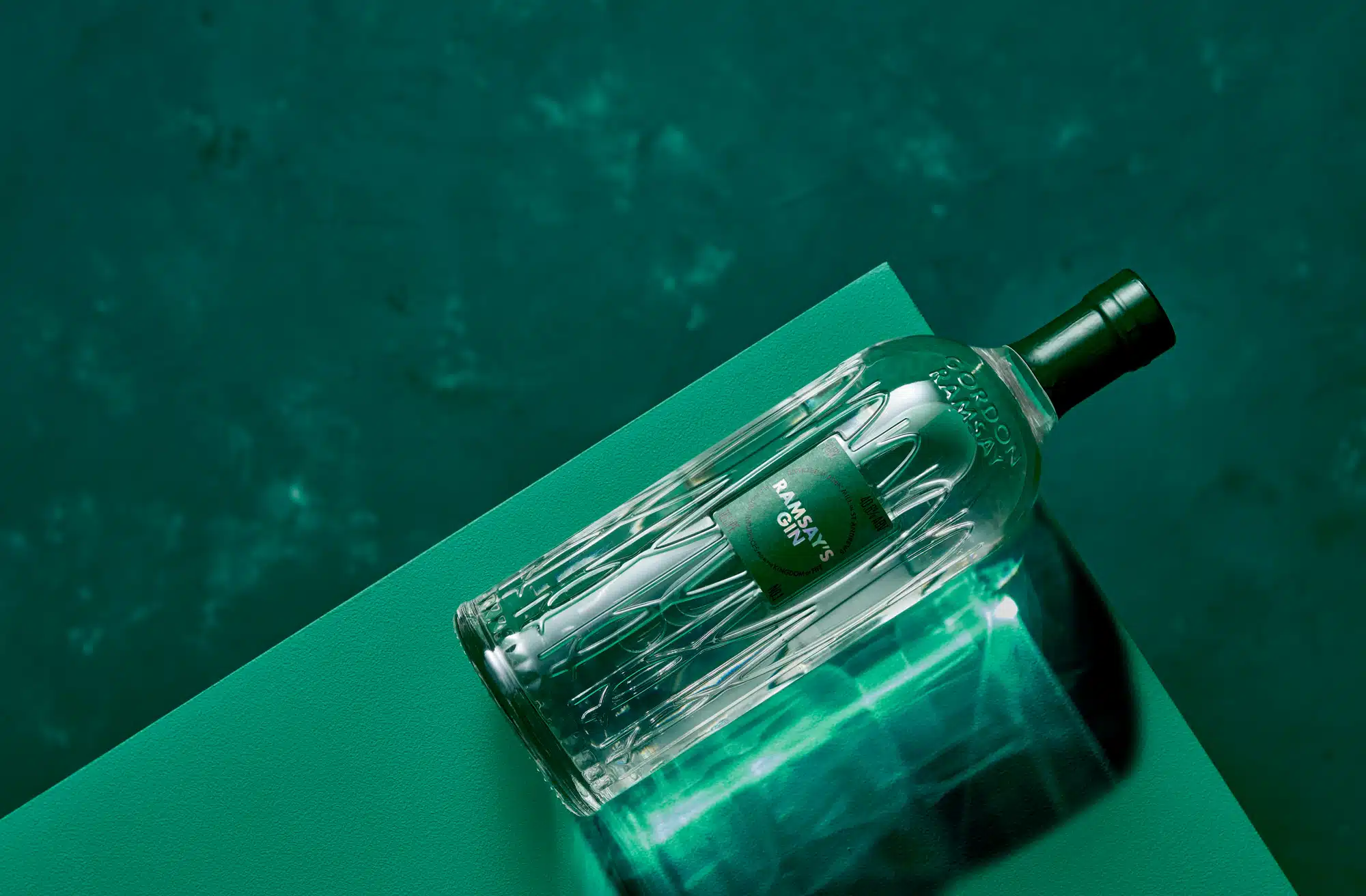 Ramsay's Gin with a green label with a green background