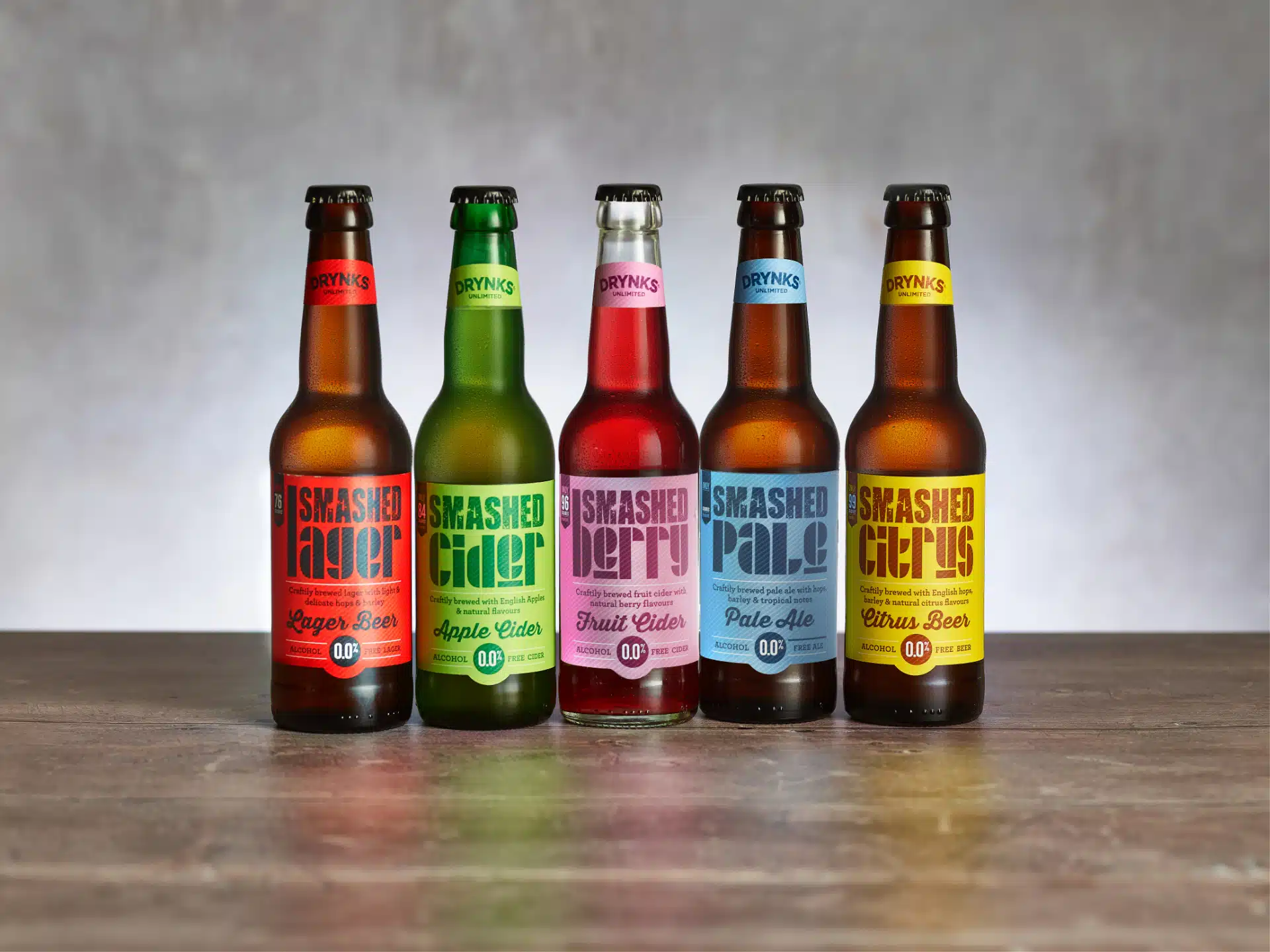 A variety of Smashed glass bottles with a neutral background