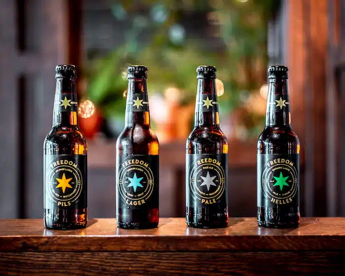 4 types of Freedom Lager amber glass bottles