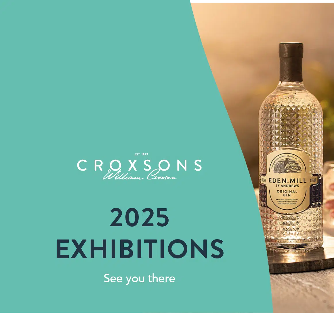 Green bottle shape with "2025 Exhibitions" in blue font on top. Eden Mill's gin bottle is displayed next to text.