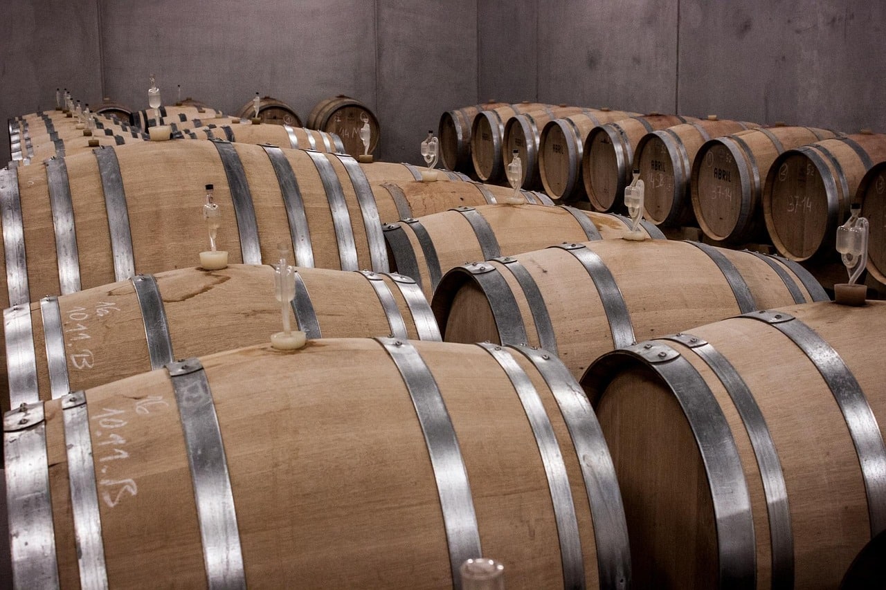 3 rows of oak wine barrels
